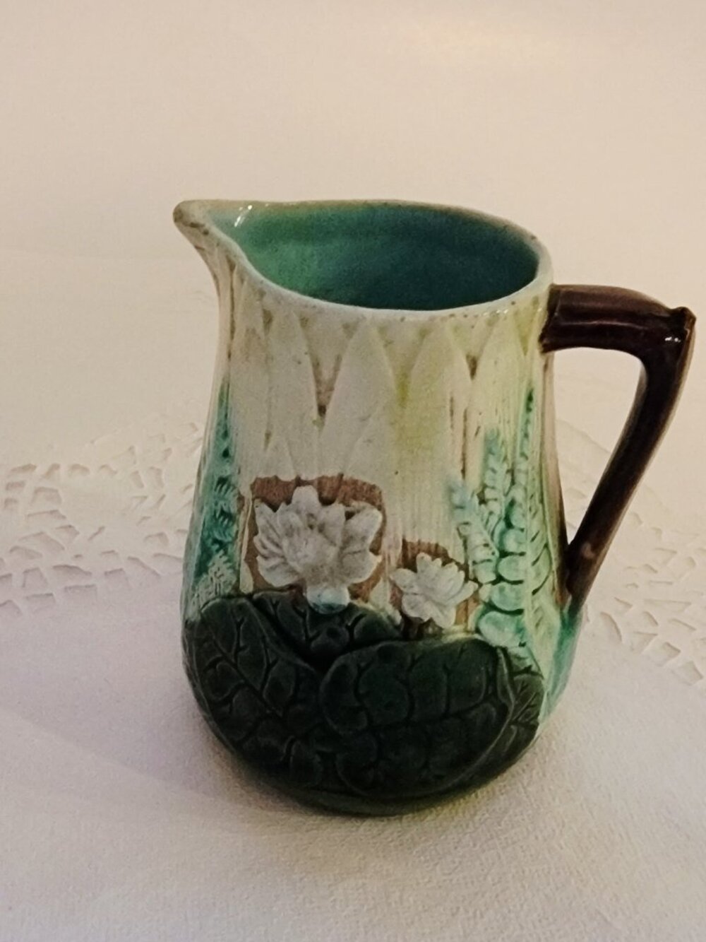 Antique Majolica Creamer Pitcher, Embossed in Earthtone colors with green leaves
